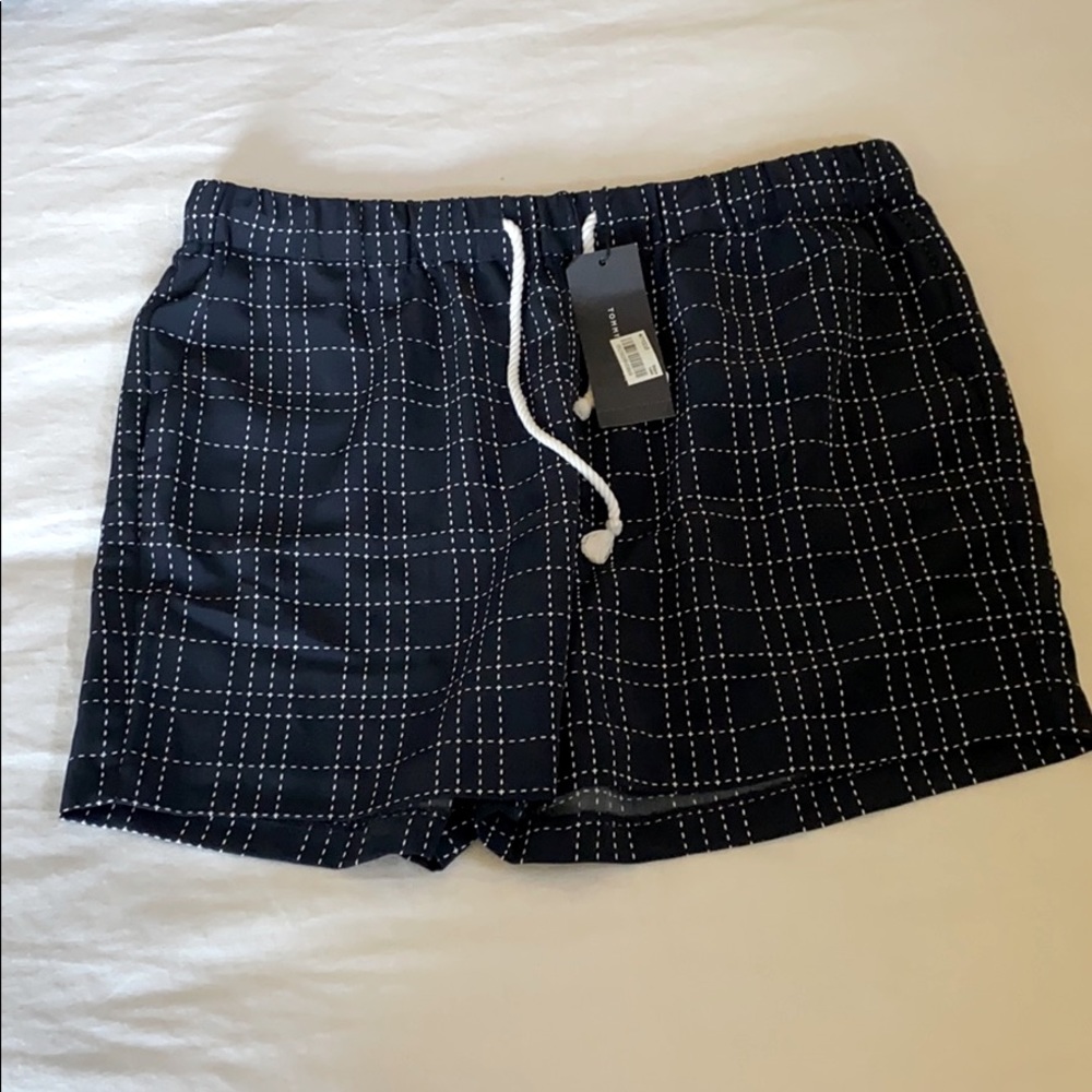 Soft polyester shorts with tags